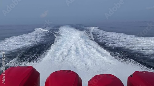 Fast motorboat racing. Speedboat. Boat is moving at high speed on the sea.