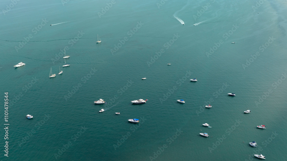 Aerial view of many boats anchored in a bay. Seaside vacation concept. Aerial view of many boats anchored in a bay. Seaside vacation concept.