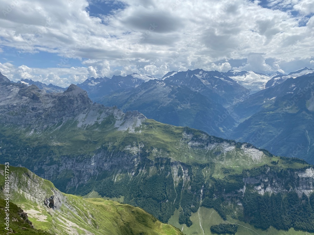 Fototapeta premium View of the Urner Alpen from the peaks above Lake Melchsee or Melch Lake in the Uri Alps mountain massif, Kerns - Canton of Obwald, Switzerland (Kanton Obwalden, Schweiz)