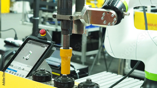 Billede på lærred High torque tightening machine with robot arm.