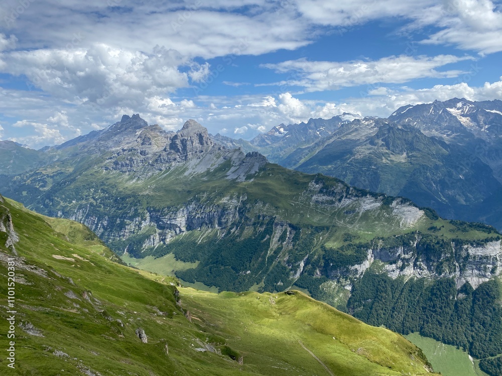 Obraz premium View of the Urner Alpen from the peaks above Lake Melchsee or Melch Lake in the Uri Alps mountain massif, Kerns - Canton of Obwald, Switzerland (Kanton Obwalden, Schweiz)