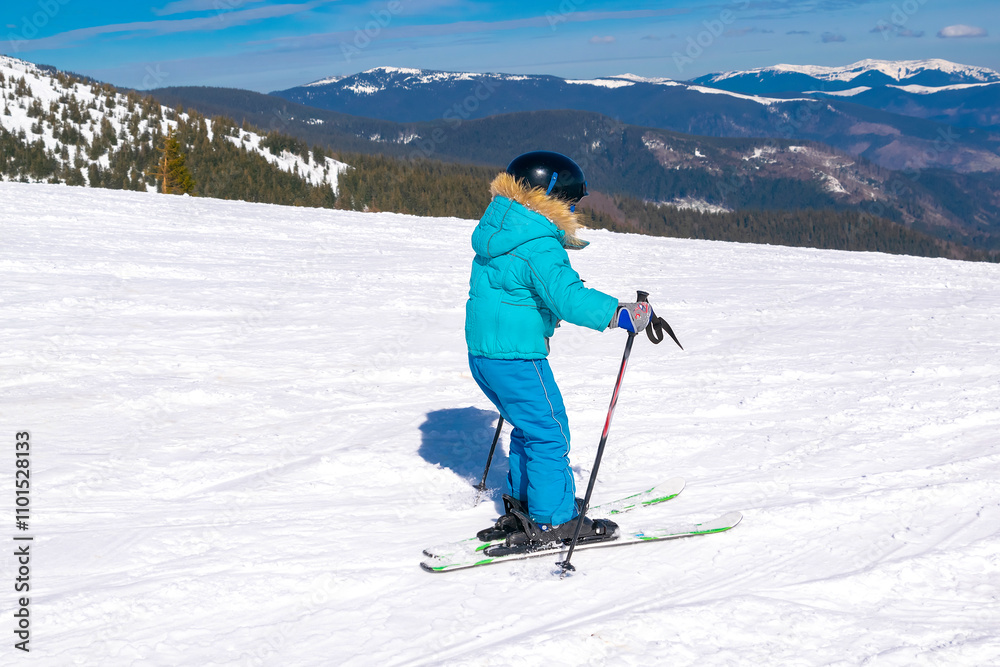 Active kid boy riding downhill,having fun learn skiing in mountains alpine winter resort.little child enjoy extreme sport activities recreation,family luxury vacation Active kid boy riding downhill,having fun learn skiing in mountains alpine winter resort.little child enjoy extreme sport activities recreation,family luxury vacation