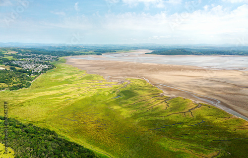 The Kent Estuary marsh and tidal mudflats looking NE from Humphrey Head on the edge of Morecombe Bay, Cumbria, England.  Grange over Sands on left