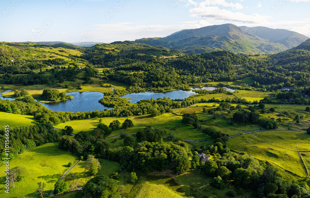 Elter Water lake near Elterwater village, Greater Langdale, Lake District National Park, England. SW to Little Langdale with Wetherlam rising behind