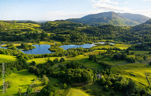 Elter Water lake near Elterwater village, Greater Langdale, Lake District National Park, England. SW to Little Langdale with Wetherlam rising behind photo