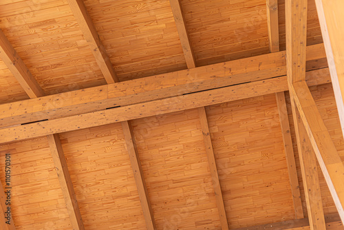 Obraz na płótnie Construction of a wooden roof of a frame house. w salonie
