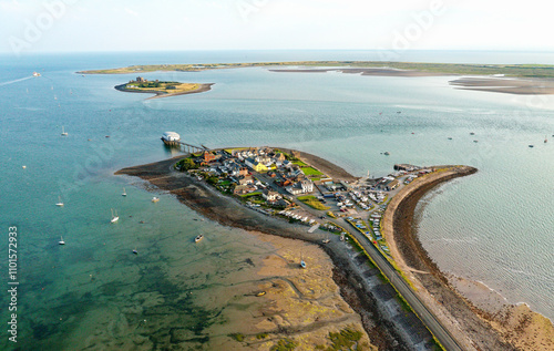 Roa Island now connected by road causeway to the south tip of Furness peninsula, Cumbria, England. View south to Piel Island and tidal Walney Channel