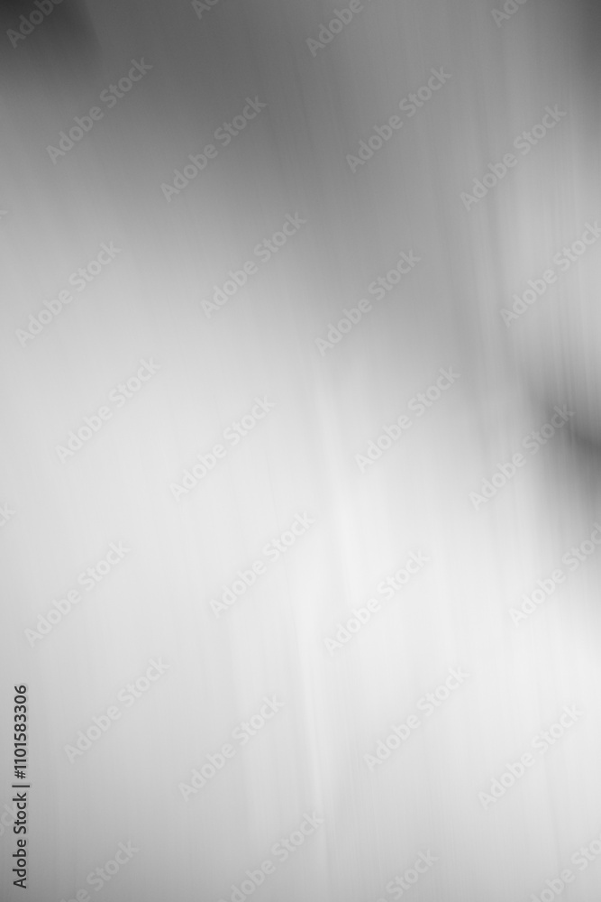 A blurry gray background with a shadow on it A blurry gray background with a shadow on it