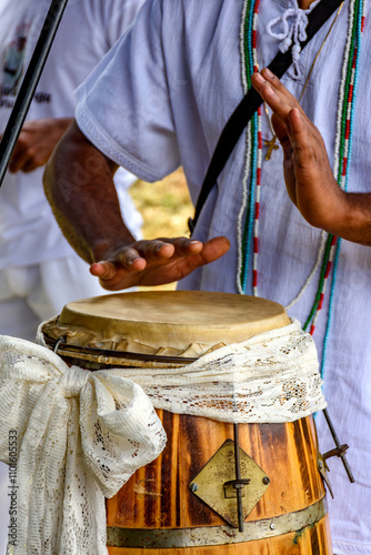 Drums decorated with fabric being used during an Umbanda ceremony in Brazil. photo