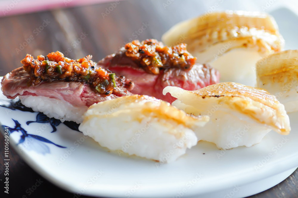 engawa sushi and gyuuniku sushi , rice topped with fish or Japanese food engawa sushi and gyuuniku sushi , rice topped with fish or Japanese food