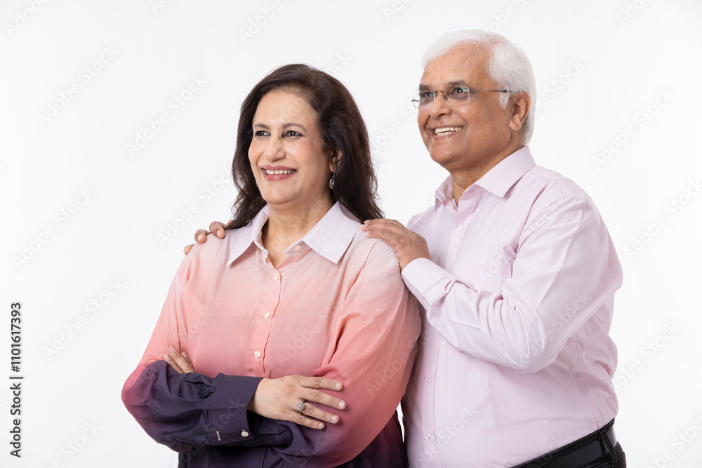 Portrait of loving senior Indian couple, standing on white background. Portrait of loving senior Indian couple, standing on white background.