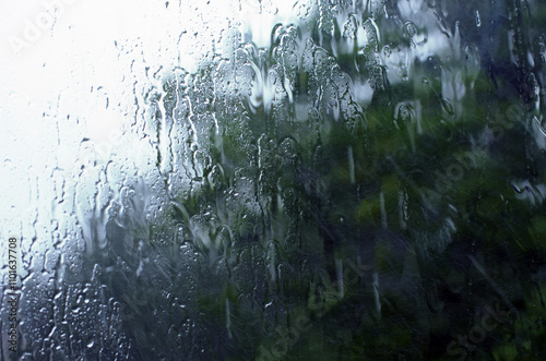 Rain drops on window glasses surface.