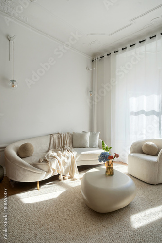 Modern living room showcasing comfort and elegance in a bright apartment