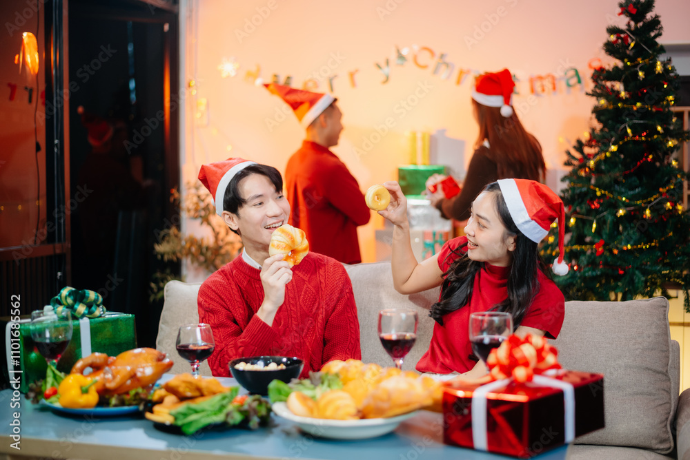 Enjoy the holiday spirit with a joyful Christmas celebration featuring friends, festive food, Santa hats, Enjoy the holiday spirit with a joyful Christmas celebration featuring friends, festive food, Santa hats,