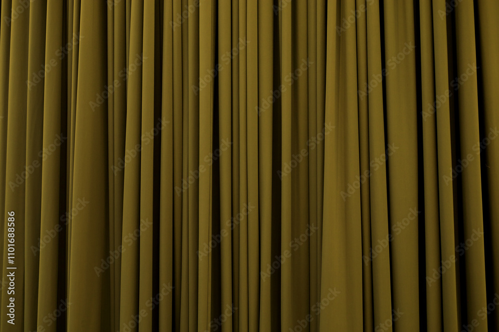 Golden curtain with many folds background texture Golden curtain with many folds background texture