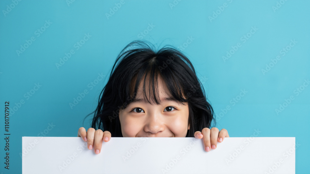 Playful Vietnamese Woman Peeking Behind Blank Banner: Perfect for Marketing, Branding, and Social Media Campaigns Playful Vietnamese Woman Peeking Behind Blank Banner: Perfect for Marketing, Branding, and Social Media Campaigns