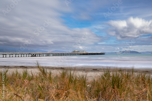 Long exposure capture of the Petone wharf on a cloudy day photo