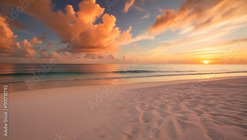 Serene Tropical Beach at Sunset with Vibrant Orange Skies photo