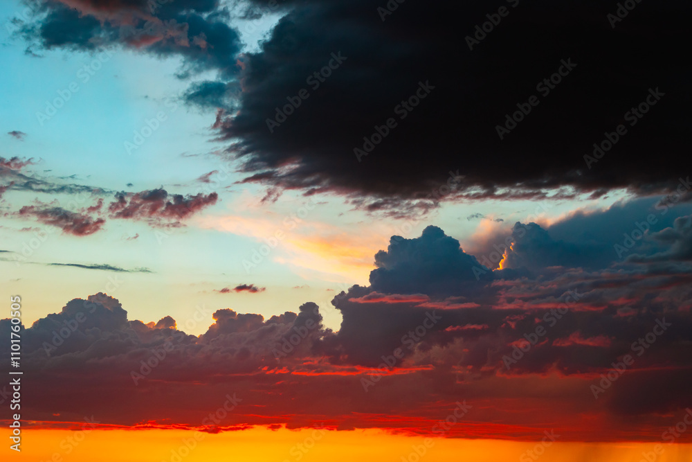 Fototapeta premium Dramatic clouds at sunset or sunrise. Weather forescast background photo.