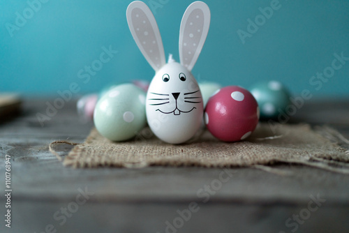 Easter bunny in front of Easter eggsEaster bunny in front of Easter eggs