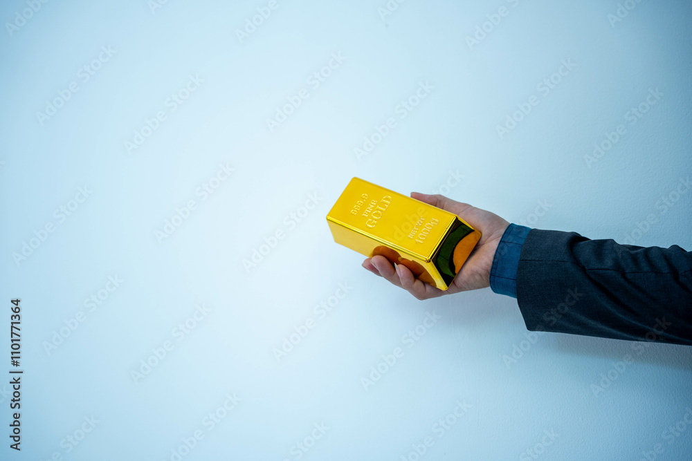 Obraz premium Gold bar stock photo, picture and photo on black table at night.