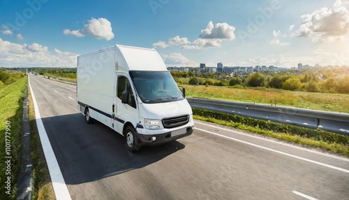 White modern delivery small shipment cargo courier van moving swiftly on a busy motorway, transporting goods efficiently and heading toward the city on a clear day with smooth traffic flow. photo