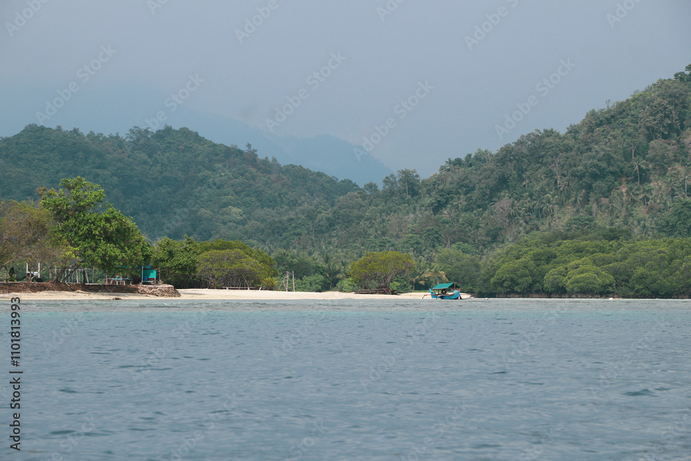 beautiful view of the tropical beach of Pahawang Island, Lampung. Landscape in the highland natural park. Panoramic view by the sea. beautiful view of the tropical beach of Pahawang Island, Lampung. Landscape in the highland natural park. Panoramic view by the sea.