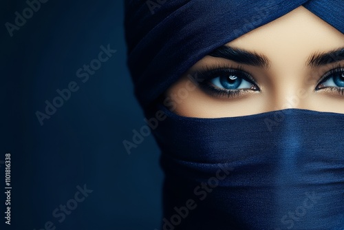 Woman wearing a blue face mask while standing outdoors in natural light durin...