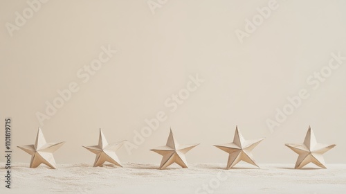 Decorative paper stars arranged on a neutral background for festive decoratio...