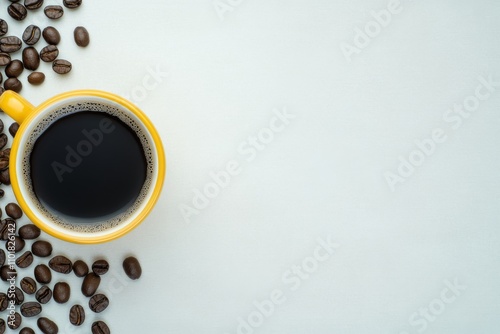 Warm cup of coffee beside scattered coffee beans on a simple white background