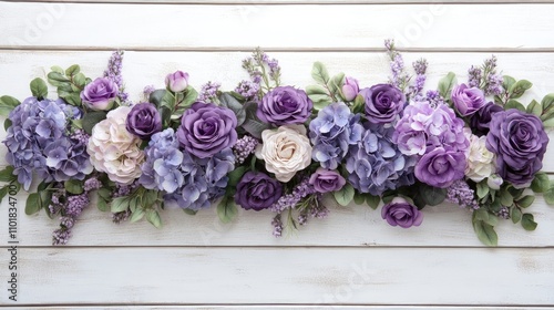 Fototapeta Naklejka Na Ścianę i Meble -  Lavender spring background adorned with lovely purple roses and hydrangeas arranged on a white wooden table. Elegant floral decor ideal for celebrations, with ample copy space.