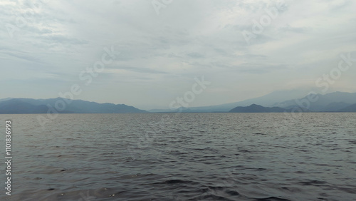 beautiful view of the tropical beach of Pahawang Island, Lampung. Landscape in the highland natural park. Panoramic view by the sea. photo