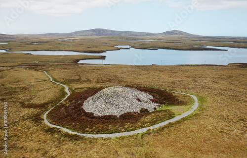 Barpa Langass aka Barpa Langais prehistoric Neolithic chambered cairn on the northwest slope of Ben Langass, North Uist. Looking NW photo