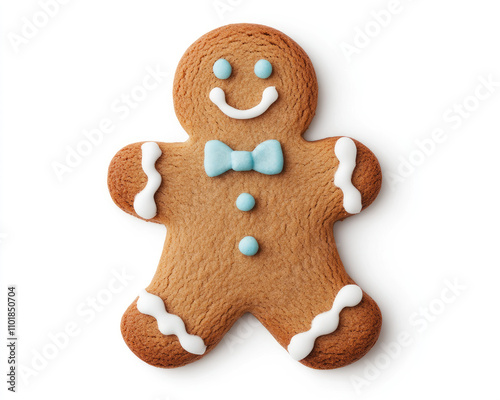 Delicious gingerbread man cookie decorated with icing and a cheerful smile isolated on white background photo