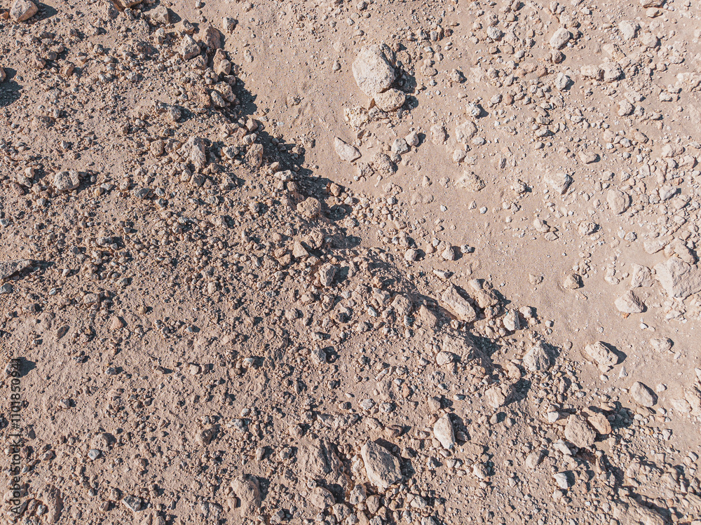 Background of stones on sand. Desert landscape. Alien view. Space surface. Day. Autumn. Egypt. Background of stones on sand. Desert landscape. Alien view. Space surface. Day. Autumn. Egypt.