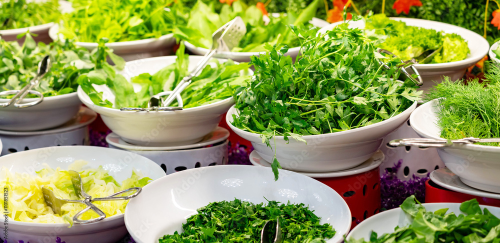 Assortment of various fresh herbs and salad leaves on a luxury hotel buffet Assortment of various fresh herbs and salad leaves on a luxury hotel buffet