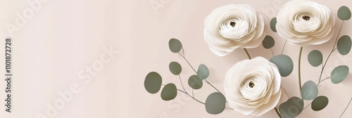 Beautiful arrangement of white flowers and greenery on a soft pastel backgrou...