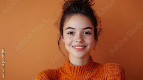 Positive young woman with a charismatic smile and approving gesture, isolated in a horizontal portrait, with ample room for additional content