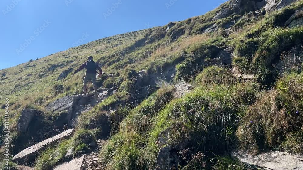 Young Hiker Walks into High Carpathian Mountains