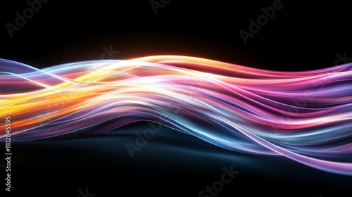 Dynamic wavy streaks of colorful light in motion, with vibrant hues of orange, pink, and blue on a black background..