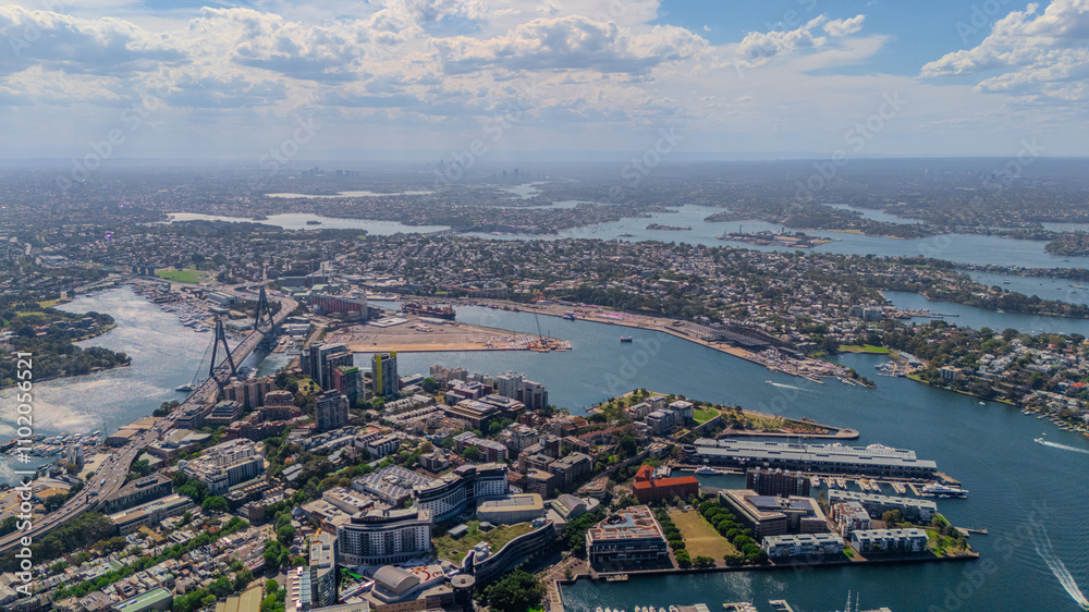 Obraz premium Aerial View of Sydney Harbour Balmain Darling harbour Sydney CBD cockle Bay Wharf North Sydney harbour bridge Lavender Bay Milsons Point Manly on a warm summer day blue skies