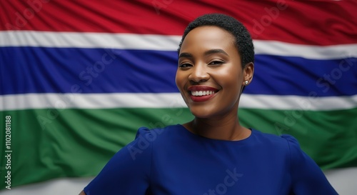 Confident african woman smiling against the gambia flag background for cultural diversity and national pride photo