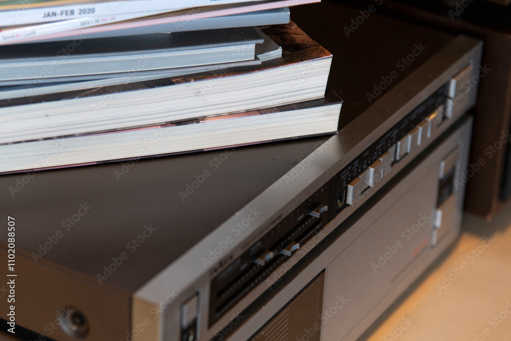 stack of the books on the audio equipment stack of the books on the audio equipment
