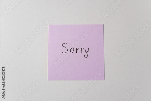Billede på lærred Handwritten pink note with Sorry written on white paper for emotional apology