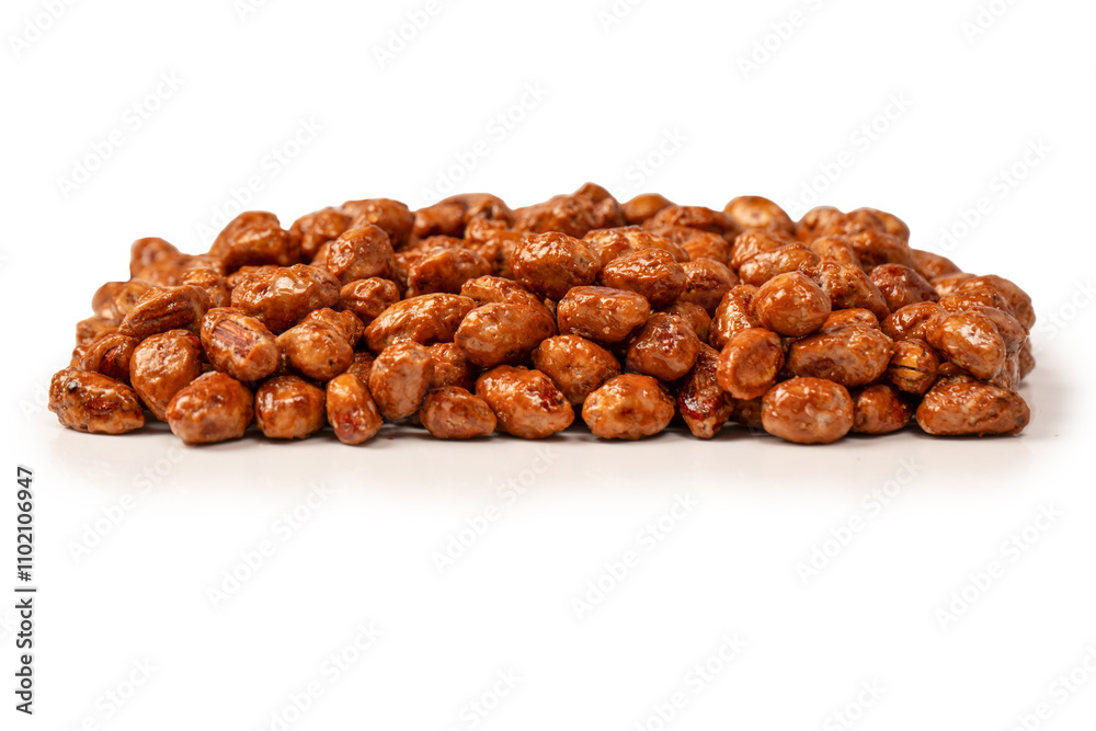 Tasty sweet roasted peanuts isolated on a white background. Tasty sweet roasted peanuts isolated on a white background.