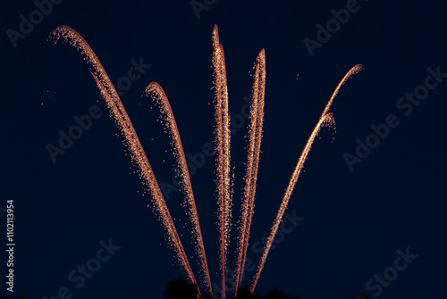 firework steams against the Midnight Sky, taken with a long exposure 