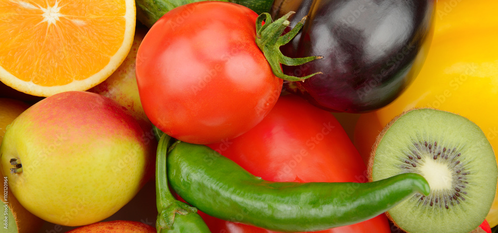 Ripe and juicy vegetables and fruits. Bright background. Ripe and juicy vegetables and fruits. Bright background.