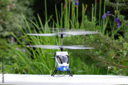 Model radio controlled helicopter prepares for take off  photo