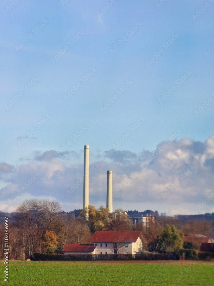 Two factory chimneys in the village. Two factory chimneys in the village.