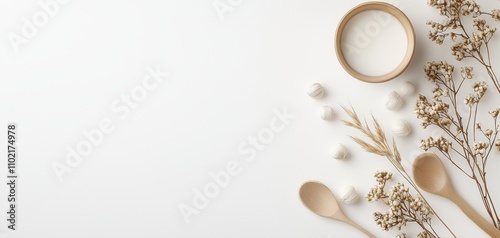 design style eclectic layout concept. A minimalist layout featuring wooden spoons, dried flowers, and a bowl, creating a serene, natural ambiance.
